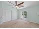 Spacious bedroom features vaulted ceilings, ceiling fan, and sliding glass doors to a balcony at 2333 Tall Sail Dr # G 607, Charleston, SC 29414