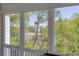 View from the screened porch showing the marsh, maritime forest and another home at 2333 Tall Sail Dr # G 607, Charleston, SC 29414