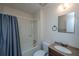 Bathroom with granite vanity and shower with blue curtain at 235 Pine Shadow Dr, Goose Creek, SC 29445
