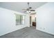 Spacious bedroom featuring a ceiling fan and ensuite bathroom at 235 Pine Shadow Dr, Goose Creek, SC 29445