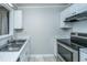 Functional kitchen features white cabinets, stainless steel appliances, and countertops at 235 Pine Shadow Dr, Goose Creek, SC 29445