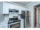 Kitchen featuring white cabinets, stainless steel appliances, and modern countertops at 235 Pine Shadow Dr, Goose Creek, SC 29445