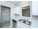Bright kitchen with white cabinets, modern countertops, and stainless steel dishwasher at 235 Pine Shadow Dr, Goose Creek, SC 29445