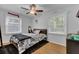 Cozy bedroom with natural light, ceiling fan, and neutral color scheme at 25 Aldene Ave, Goose Creek, SC 29445