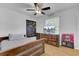 Comfortable bedroom with a ceiling fan and TV at 25 Aldene Ave, Goose Creek, SC 29445