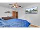 Bedroom with a TV, wood floors, and natural light at 25 Aldene Ave, Goose Creek, SC 29445