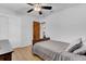 Bedroom featuring light hardwood floors, gray walls, and a ceiling fan at 25 Aldene Ave, Goose Creek, SC 29445