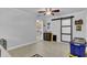 Large bonus room with a sliding barn door and access to the kitchen creating a versatile and functional space at 25 Aldene Ave, Goose Creek, SC 29445