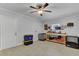 Spacious bonus room featuring a ceiling fan, ample storage, and versatile workspace for various activities at 25 Aldene Ave, Goose Creek, SC 29445