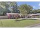 Charming single-story brick home with a well-manicured front lawn and trees at 25 Aldene Ave, Goose Creek, SC 29445