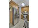 Spacious kitchen featuring modern stainless steel refrigerator and range oven, complemented by warm-toned cabinetry at 25 Aldene Ave, Goose Creek, SC 29445