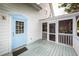 Inviting back porch with screened doors and a bright blue exterior door at 2613 Rivertowne Pkwy, Mount Pleasant, SC 29466