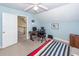 Bedroom with desk, chair, and carpet flooring. Access to upstairs hallway at 2613 Rivertowne Pkwy, Mount Pleasant, SC 29466