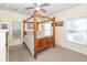Bedroom featuring a wooden canopy bed, ceiling fan, and ample natural light at 2613 Rivertowne Pkwy, Mount Pleasant, SC 29466