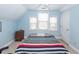 Comfortable bedroom featuring a bed, chest of drawers, soft carpet, and natural light from the window at 2613 Rivertowne Pkwy, Mount Pleasant, SC 29466