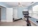 Home gym featuring exercise equipment, ceiling fan and natural light from the windows at 2613 Rivertowne Pkwy, Mount Pleasant, SC 29466