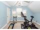 Exercise room featuring workout equipment and bright natural light from the windows at 2613 Rivertowne Pkwy, Mount Pleasant, SC 29466