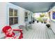 Charming front porch with seating and potted plants at 2613 Rivertowne Pkwy, Mount Pleasant, SC 29466