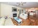 Inviting living room with a fireplace, hardwood floors, and a bright atmosphere at 2613 Rivertowne Pkwy, Mount Pleasant, SC 29466