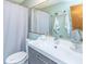 Bathroom with updated vanity, modern mirror, and shower with curtain at 2650 Summer Leaves Ct, Charleston, SC 29414