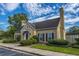 Community clubhouse with manicured landscaping and classic architectural details at 2650 Summer Leaves Ct, Charleston, SC 29414