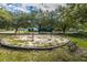 Community playground with swings, spring rider, and bench seating at 2650 Summer Leaves Ct, Charleston, SC 29414
