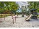 Community playground featuring slides, climbers, and play structures at 2650 Summer Leaves Ct, Charleston, SC 29414