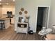 Living room view to kitchen area with modern furniture at 305 Camellia Bloom Dr, Moncks Corner, SC 29461