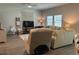 Comfortable living room featuring a neutral color scheme, hardwood floors, and natural light at 305 Camellia Bloom Dr, Moncks Corner, SC 29461