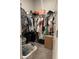 Spacious walk-in closet offering ample storage with shelving and hanging racks at 305 Camellia Bloom Dr, Moncks Corner, SC 29461