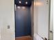 Private residential elevator with wooden floor and interior lighting at 305 Matilda St, Edisto Beach, SC 29438