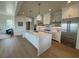 Elegant kitchen with a large island and stainless steel appliances at 305 Matilda St, Edisto Beach, SC 29438