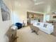 Cozy living room with views of the modern kitchen and dining room area at 305 Matilda St, Edisto Beach, SC 29438