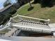 Exterior stairs with white railings and cable detail at 305 Matilda St, Edisto Beach, SC 29438