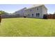 Spacious backyard with ample green space, ideal for outdoor activities and relaxation at 308 Legendres Dr, Goose Creek, SC 29445