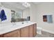 Bathroom featuring double sinks, a large mirror, and ample counter space at 308 Legendres Dr, Goose Creek, SC 29445