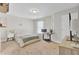 Comfortable bedroom features carpet, a neutral color palette, and desk for studying at 308 Legendres Dr, Goose Creek, SC 29445