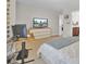 Inviting bedroom with a desk, TV, and attached bathroom for added convenience and privacy at 308 Legendres Dr, Goose Creek, SC 29445