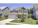 Beautifully landscaped home with a well-maintained lawn and inviting curb appeal at 308 Legendres Dr, Goose Creek, SC 29445