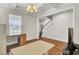 Home office space featuring hardwood floors, natural light, and staircase at 308 Legendres Dr, Goose Creek, SC 29445