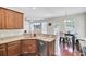 Open kitchen with stainless steel appliances, granite countertops, and an eat-in dining area at 308 Legendres Dr, Goose Creek, SC 29445
