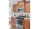 Well-equipped kitchen featuring stainless steel appliances, gas range, and granite countertops at 308 Legendres Dr, Goose Creek, SC 29445