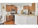 Bright kitchen featuring stainless steel appliances, granite countertops, and hardwood floors at 308 Legendres Dr, Goose Creek, SC 29445
