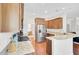 Spacious kitchen with hardwood floors, stainless steel appliances, granite countertops, and ample cabinet space at 308 Legendres Dr, Goose Creek, SC 29445