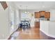 Eat-in kitchenette area with hardwood floors, natural light, and table with bar stool seating at 308 Legendres Dr, Goose Creek, SC 29445