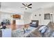 Open-concept living room with hardwood floors, modern furniture, and a ceiling fan at 308 Legendres Dr, Goose Creek, SC 29445
