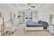 Serene main bedroom with a tray ceiling, neutral decor, and a comfortable bed at 308 Legendres Dr, Goose Creek, SC 29445