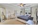 Comfortable main bedroom with a sitting area, dresser, and bedside table at 308 Legendres Dr, Goose Creek, SC 29445