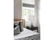 Stylish bedroom showcasing a window with natural light, accented by a modern lamp and decorative pillows at 3139 Vanessa Lynne Ln, Johns Island, SC 29455