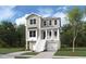 Charming two-story home with a inviting front porch, featuring a classic exterior, set amidst lush greenery at 3139 Vanessa Lynne Ln, Johns Island, SC 29455